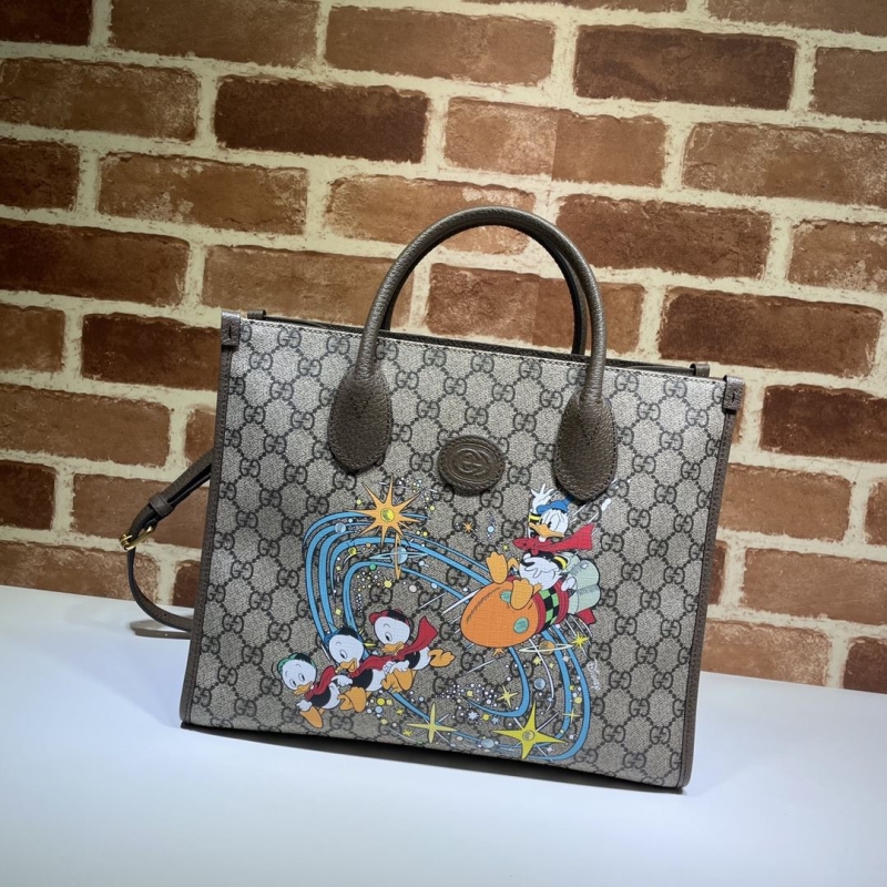 G*u*i shopping bags